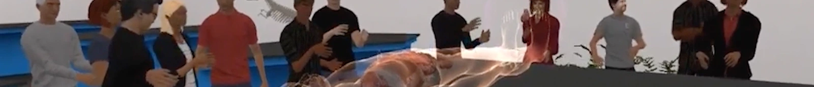 Avatars gathered around a life-size anatomy hologram on a lab table inside the platform